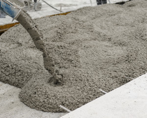 mixed concrete pouring at construction site